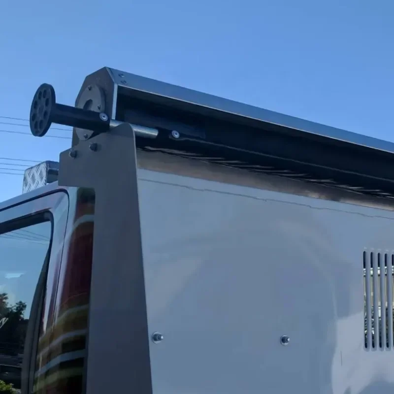 

Tippers pull out retractable tarp system
