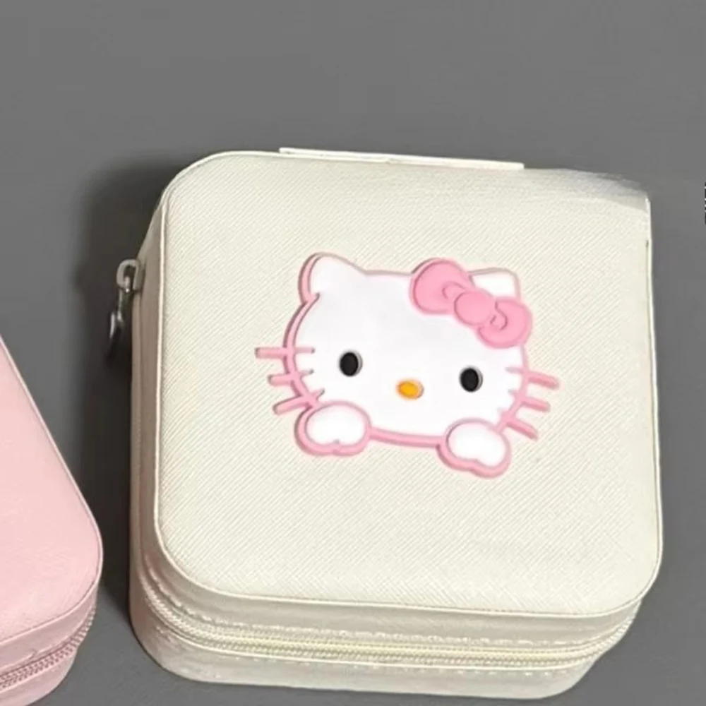 กล่องใส่เครื่องประดับแมวน่ารักสีชมพู Sanrio รุ่นใหม่ ขายดี พกพาสะดวก กล่องเก็บแหวน ต่างหู กล่องเก็บอุปกรณ์เสริมขนาดเล็กพกพาสำหรับเดินทาง