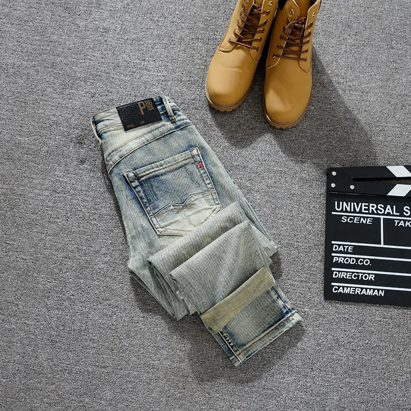

Retro nostalgic slim fit small straight leg jeans for young men, fashionable and handsome, ripped patch denim, heavyweight pants
