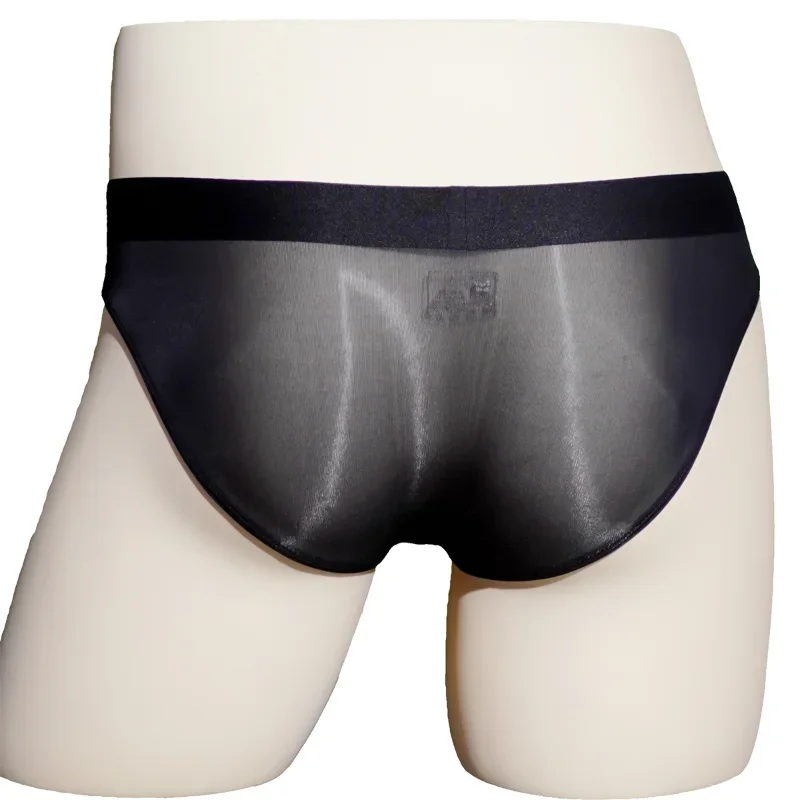 

Men's Briefs See-Through Underwear Ice Silk Seamless Panties Sexy Oil Shiny Glossy Transparent Underpants U Convex Pouch Bikini