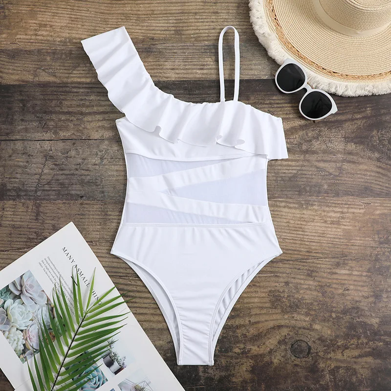 Traje de baño Sexy de Color sólido para mujer, traje de baño de retazos de malla de una pieza, ropa de playa de un hombro con volantes a la moda