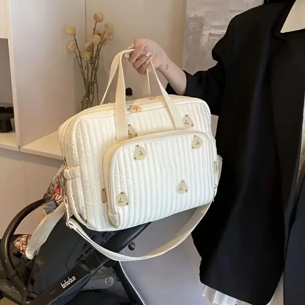 

Large Capacity Mommy Diaper Bag with Embroidered Teddy Bear Design Shoulder & Crossbody Wear, Durable Polyester Filling