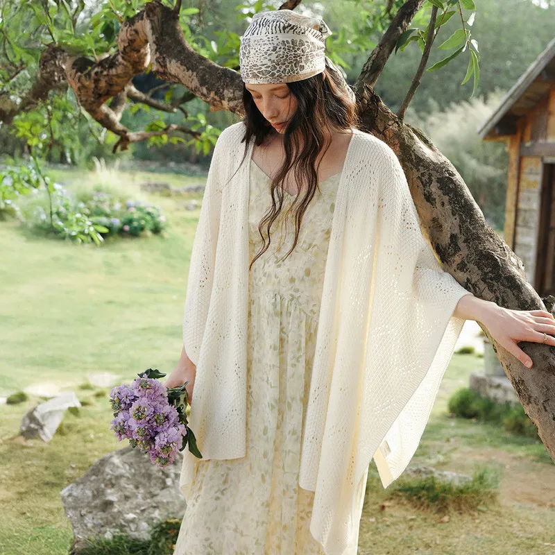 سترة نسائية محبوكة من OLrain سترة مفرغة على الطراز الفرنسي لربيع 2026 سترة فضفاضة غير متماثلة بحاشية غير متماثلة O58CZ002390