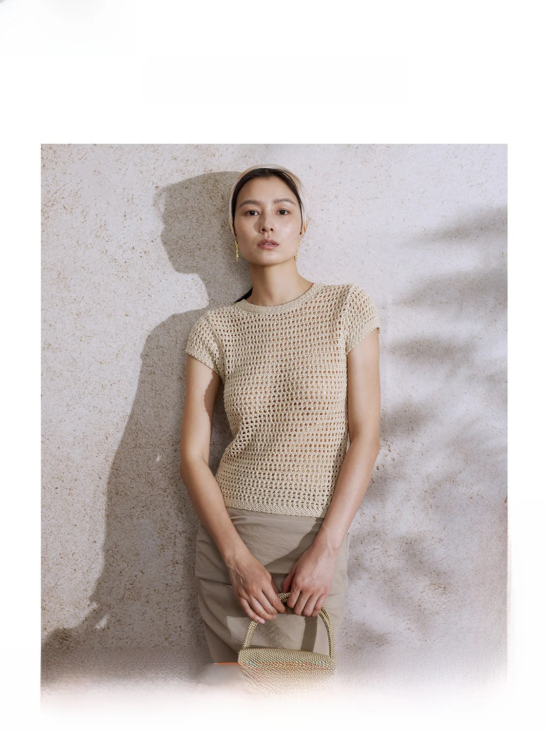 

ZhiZhi Jiang n Hollow out Knitted ort Sve Women's T-irt Summer 2025 New Holiday Sle Simple Cotton Knitwear