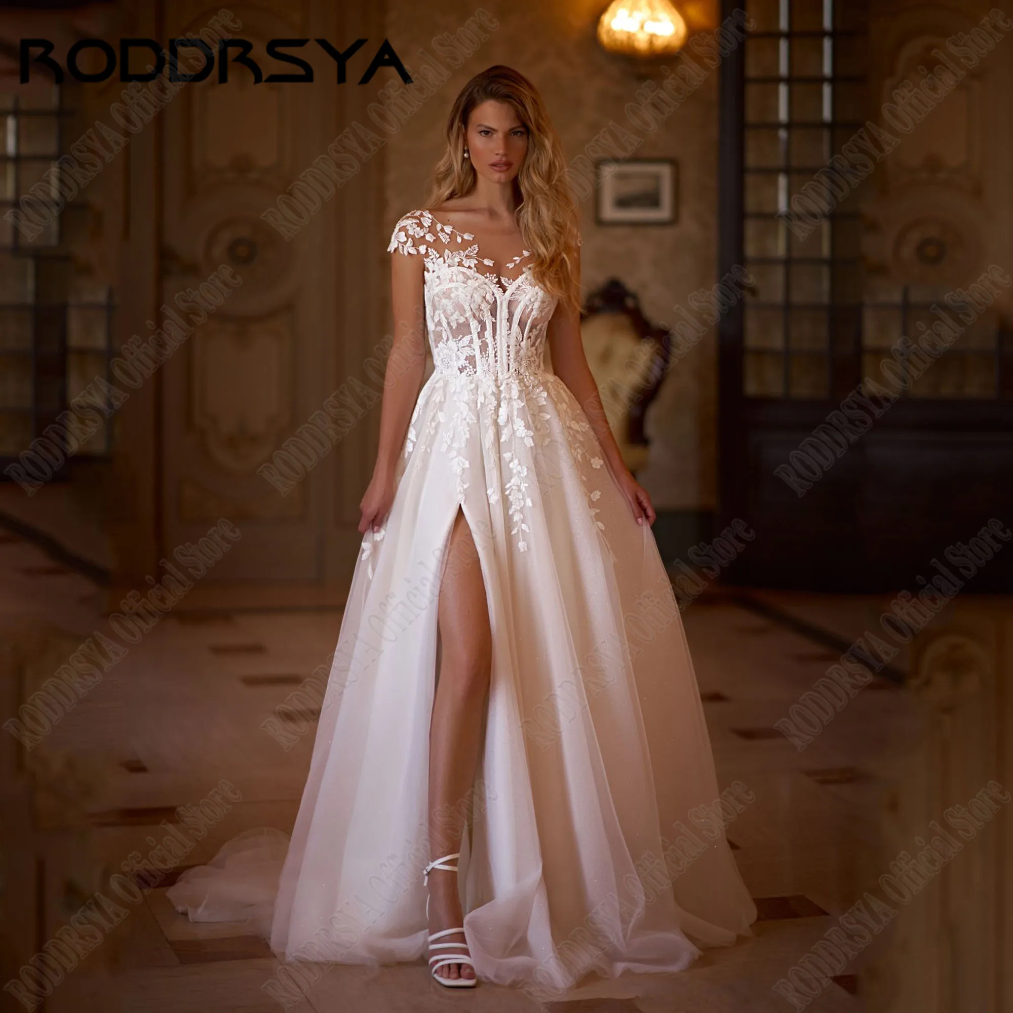 

RODDRSYA Glitter A-line Wedding Gowns Cap Sleeves Applique O-Neck Wedding Dress 2025 Bride Illusion Back Bridal Gown Custom