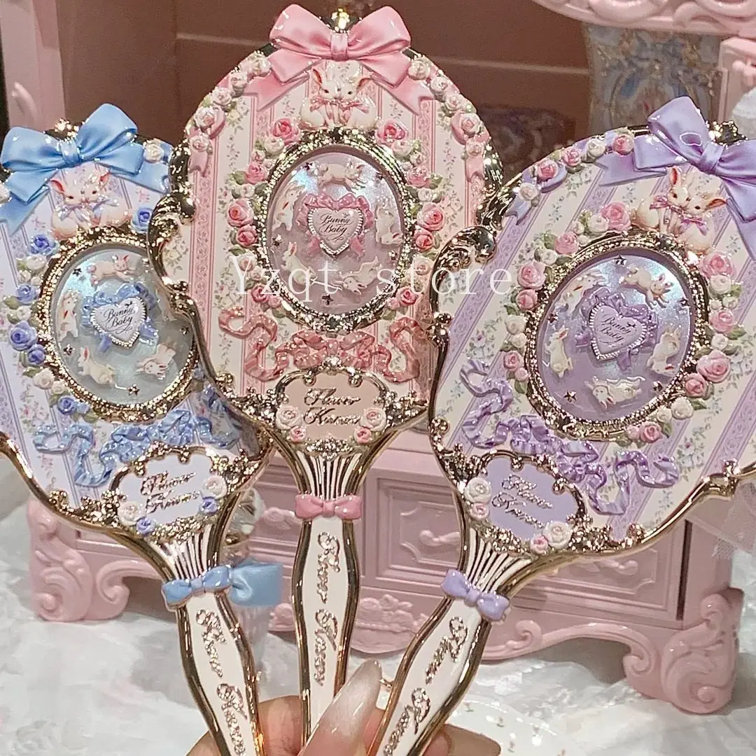 White, blue, pink and chocolate fairy designs, handheld limited edition mirror