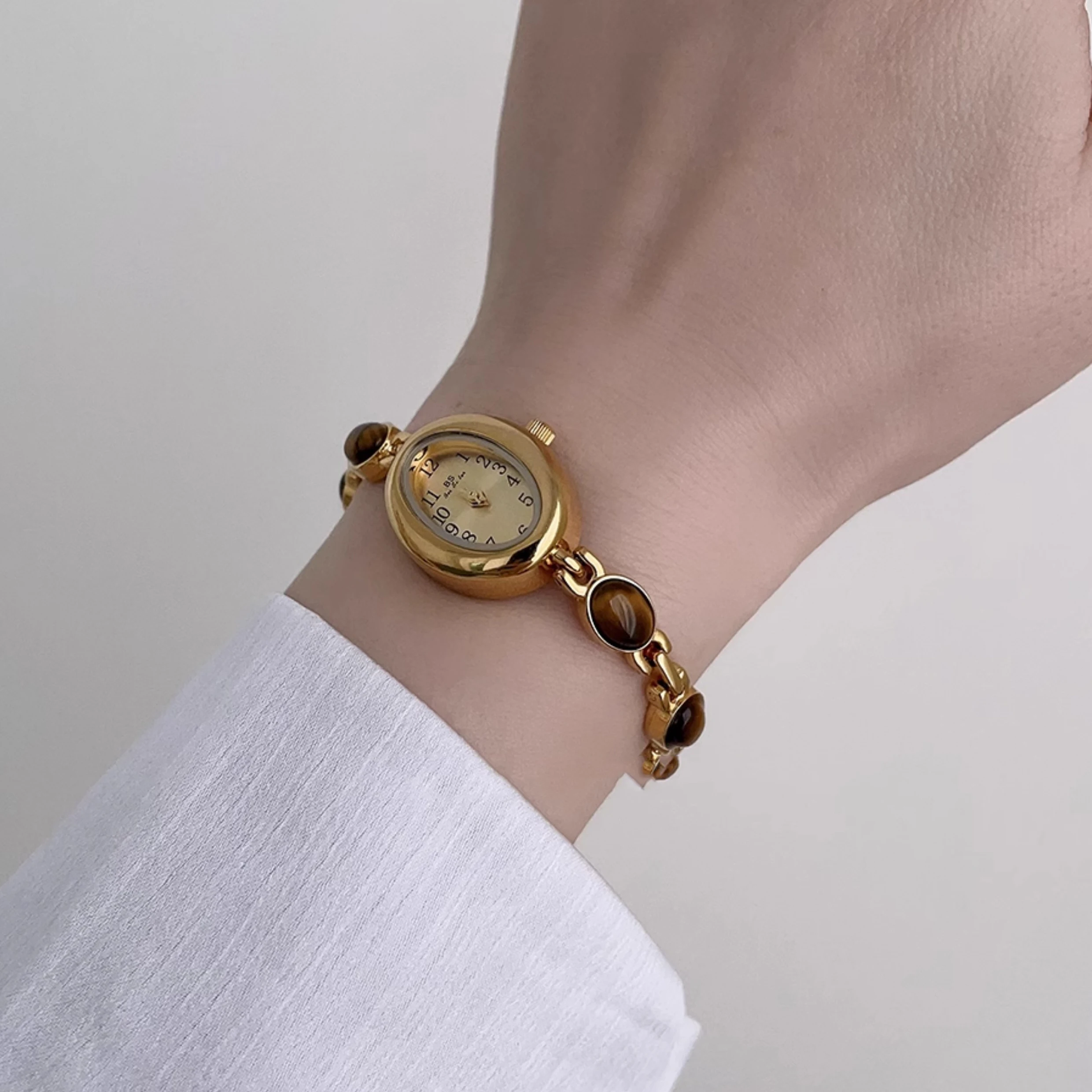 Relojes de lujo de alta gama para mujer, piedras preciosas de Esmeralda dorada, resistente al agua, ovalados, elegantes, de cuarzo, accesorios para mujer 2025