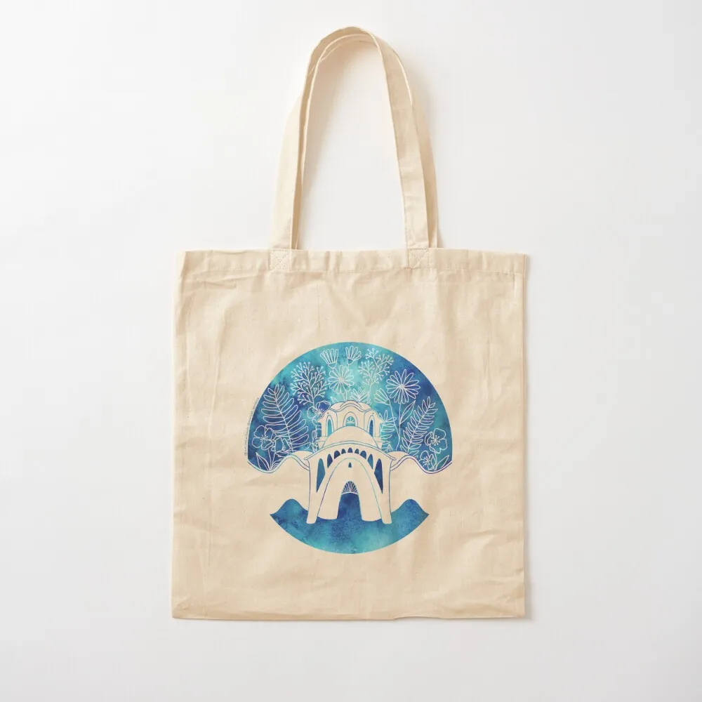 

This design combines floral motifs and blue tones to highlight the originality of the local symbol. Tote Bag