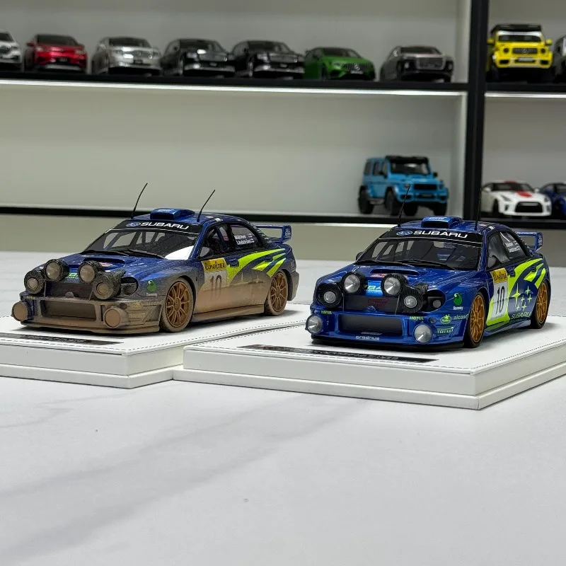 

In stock 1/18 SUBARU Impreg STI WRC 2002 Monte Carlo Rally resin car model, Boys' toy, adult collectible ornament.