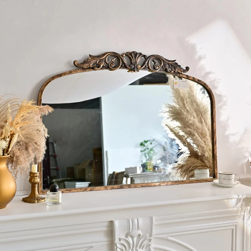 35.43 inches wide x 29.13 inches long, hand-crafted antique bronze arched metal wall mirror