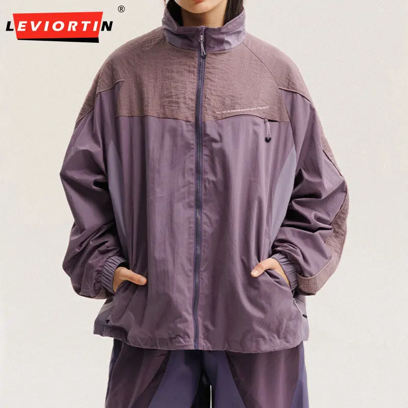 Men's high street trendy contrasting color splicing design, mountain style outdoor sports and leisure hooded anti roll jacket