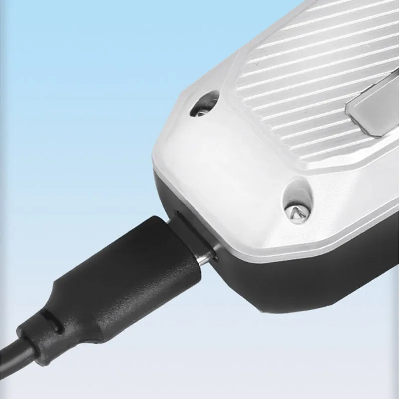 Kemei 1679 電気バリカン男プロフェッショナルワイヤレスヘアカットマシンヘア & ひげトリマー彫刻バリカン充電式