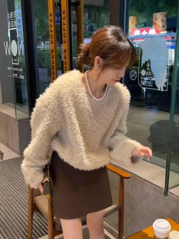 

Korean Laid-ba Sle Loose Long Sve round Ne Knitted Sweater Women Winter New Soft Plu Warm Knitwear Casual Top