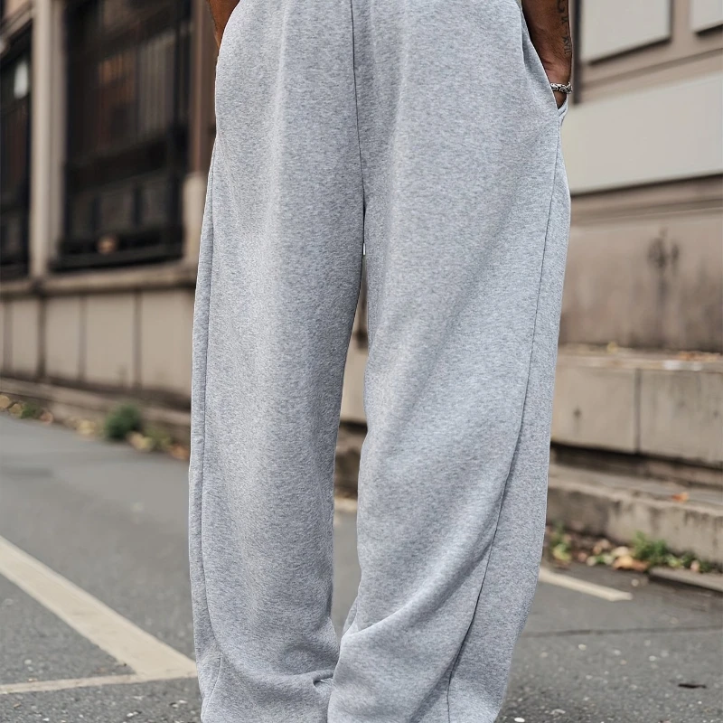 Nuovi pantaloni sportivi da uomo in stile college classico versatile con tasca diagonale e coulisse, colore pulito, autunno e inverno