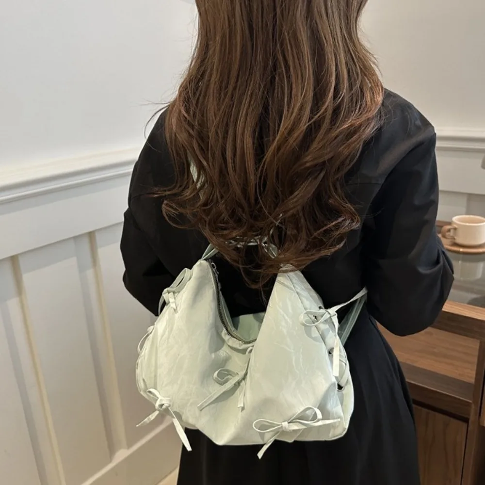 Bolsa de ombro bowknot de couro PU para mulheres, estilo coreano suave, monocromática, impermeável, tiracolo, bolsas ao ar livre