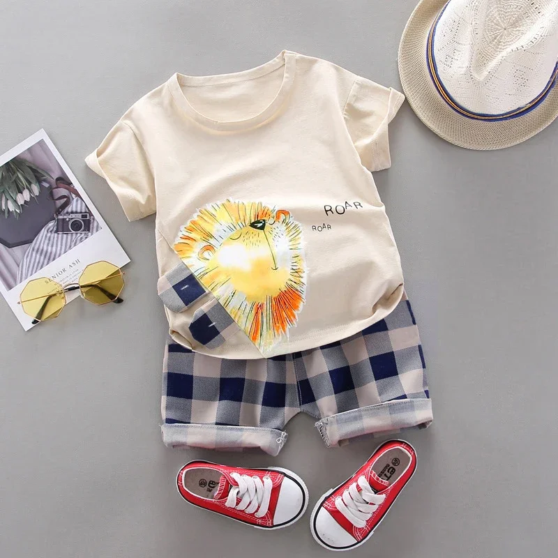 PatPat 2pcs Toddler Boy Playful Lion Letter Print Tee and Plaid Shorts Set Perfect for Outings and Daily Wear Basic Style