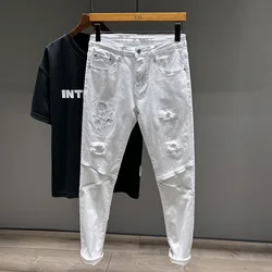 White jeans men's ripped fashion design street casual Pu handsome stretch slim stretch casual feet trousers