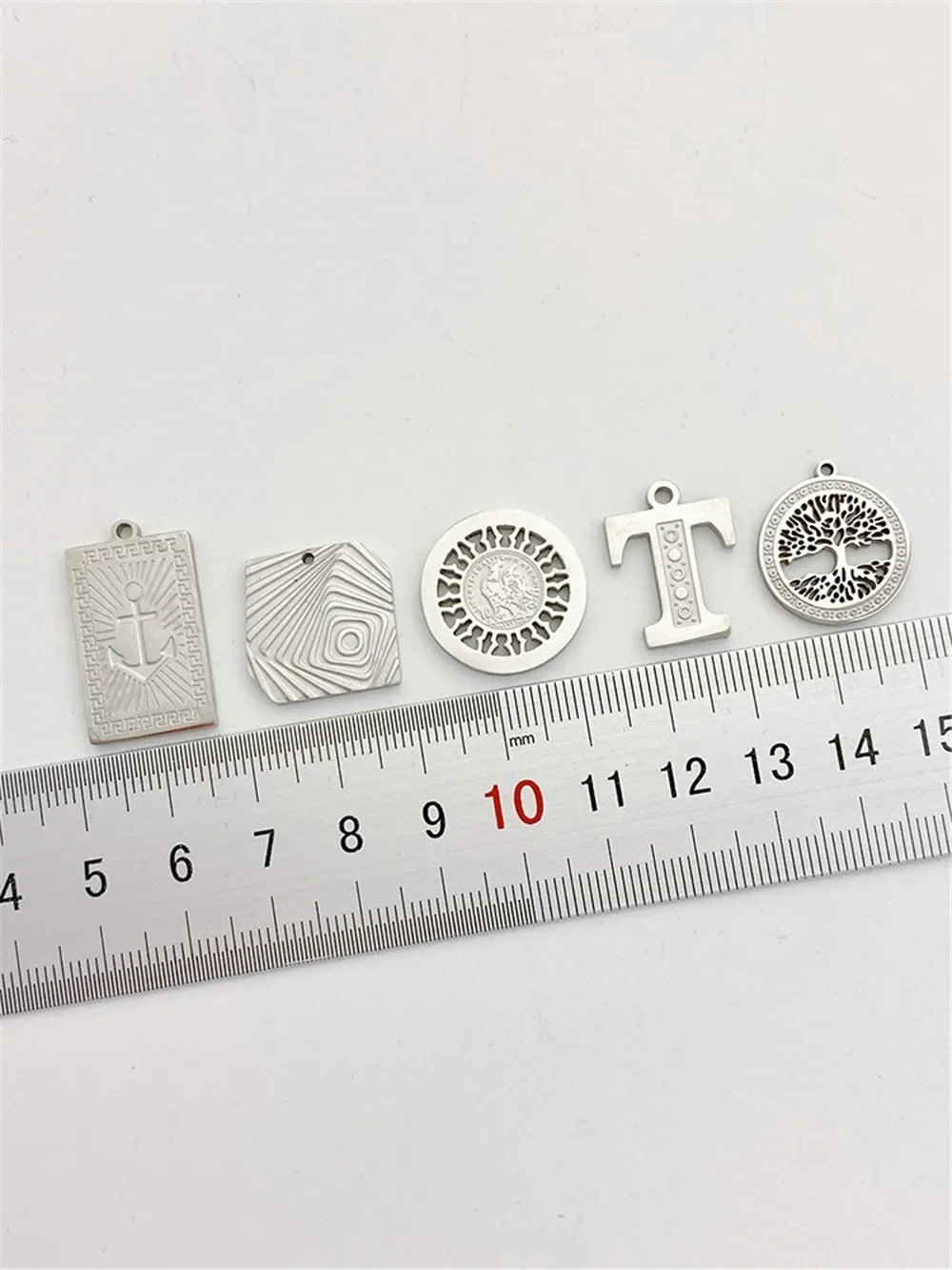 

Titanium Steel Stainless Steel Colorfast Metal Rudder Anchor Feather Pendant Handmade Diy Bracelet Necklace Trend Pendant L512