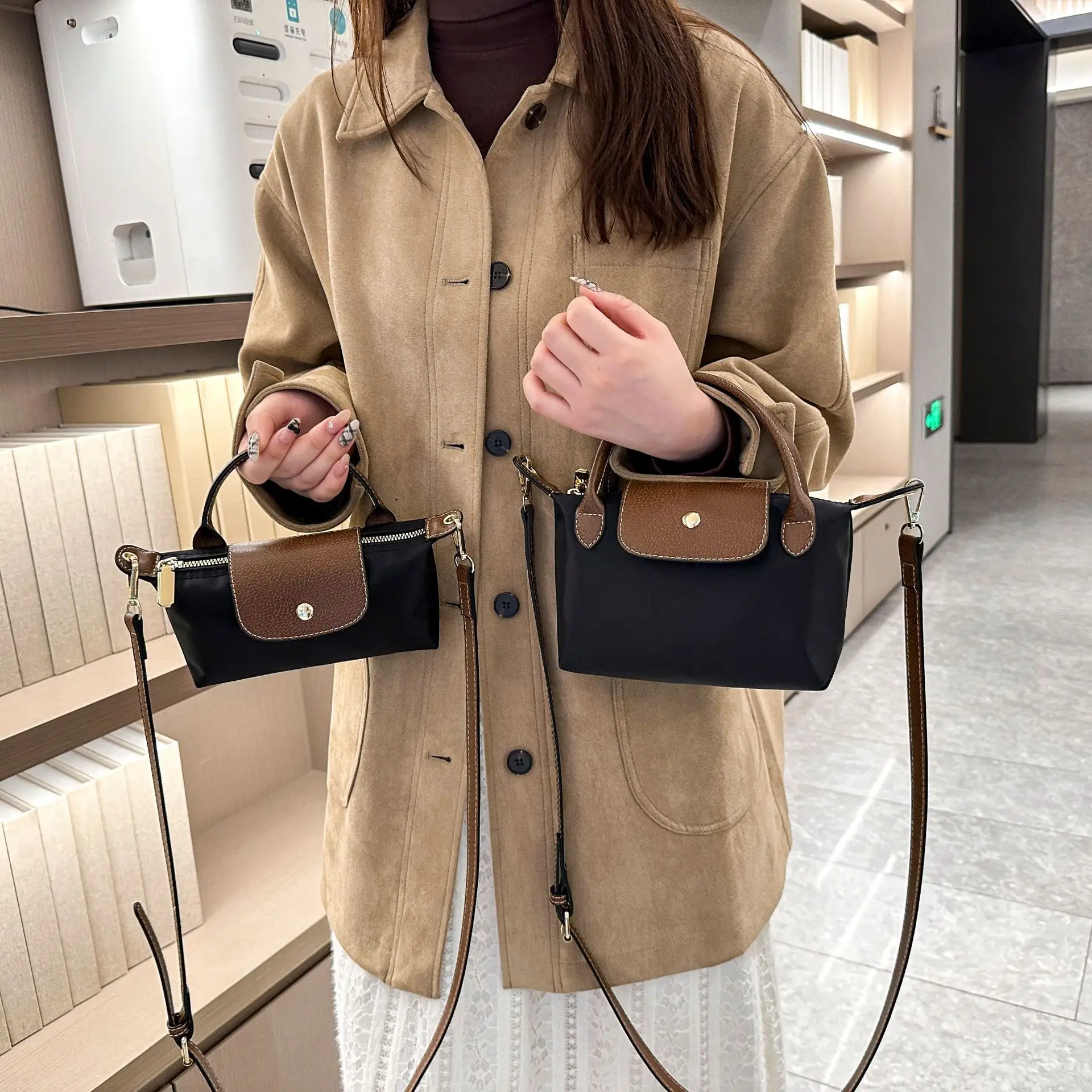 

2025 winter new French large-capacity dumpling bag niche hand-held one-shoulder nylon crossbody bag