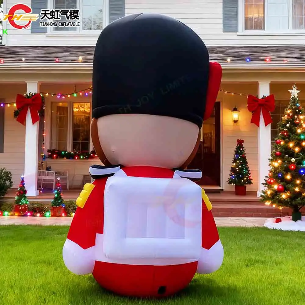 Transporte aéreo rápido soldado inflável dos desenhos animados tema do reino unido modelo de decoração inflável de natal com ventilador