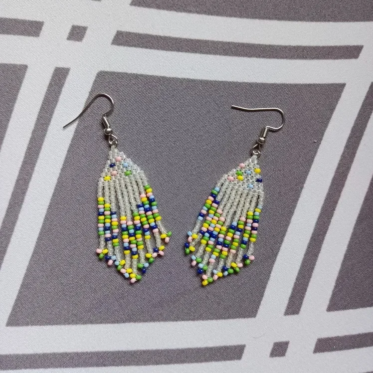 

Rice bead earrings Fashion Contracted Hand woven Tassel Alloy Female Bohemia The geometric Beaded earrings