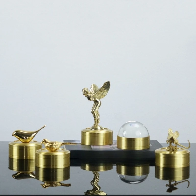 

Light luxury creative storage small head jewelry box ins copper color handmade Nordic new Zhongshan wedding products entrance