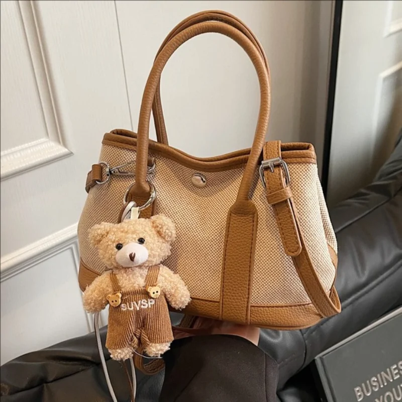 

Retro patchwork hand-held bucket bag for women 2026 new trend shoulder bag casual versatile crossbody bag