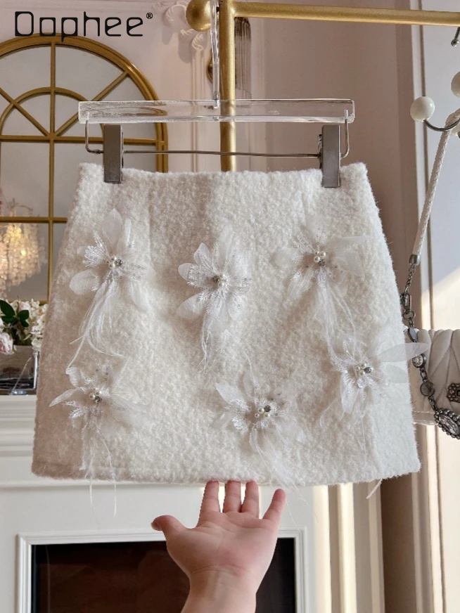 

2026 Spring New Heavy Beaded Rhinestone Feather Patchwork Woolen A-line Skirts High-Waisted Slim Elegant Socialite Mini Skirt