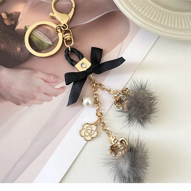 Newest Luxury Mink Fur Ball Crown Keychains for Women Bag Charm Pendant Fashion Bowknot Keyrings Car Key Chain Creative Key Ring