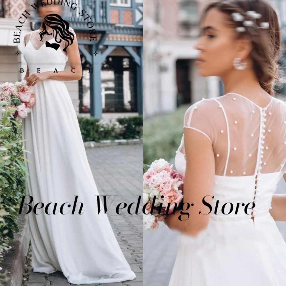 

Beach Customized Pearls Boho Simple Wedding Dresses Newest Short Sleeves A Line Garden robes de mariée Sheer Top Sweep Train