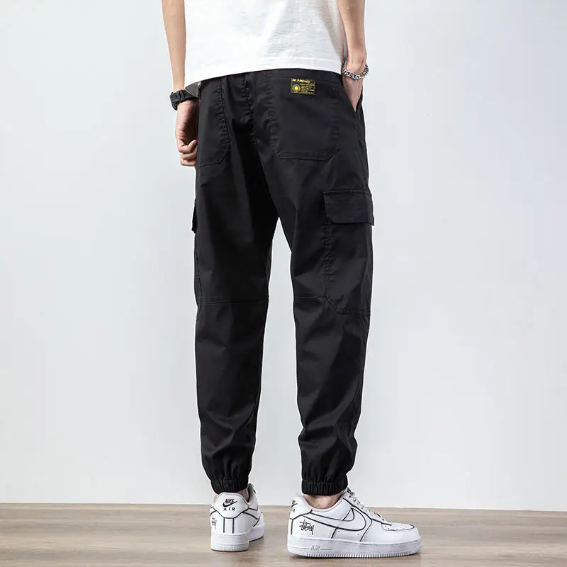 Street Casual Multiple Pockets Waist Drawcord Men's Cargo Pants Loose Pasting Cloth Korean All-match Tie One's Feet Trousers