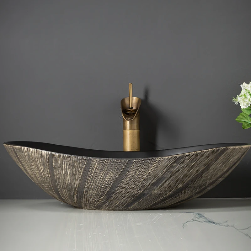 

On-stage basin Ceramic washbasin Household balcony Courtyard Outdoor basin Yuanbao Hotel Art sink