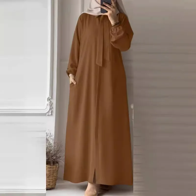 2024 Muslim Women's  Fashion Bow Tie Flip Collar Solid Color Long Sleeved Shirt Sun Skirt Pocket Loose Cardigan Long Dress