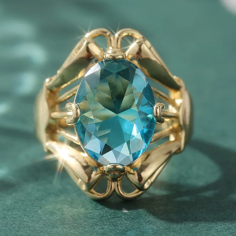 Wunderschöner Eingelegter Meerblauer CZ Damenring Trendiger Goldfarbener Handgravierter Hohler Alltags- und Partyschmuck Jubiläumsgeschenk – Detail 3
