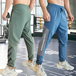 Pantalones de chándal de entrenamiento para gimnasio, ropa atlética para correr, pantalones deportivos de adiestramiento al aire libre, cintura elástica, bolsillos con cremallera, pantalones largos