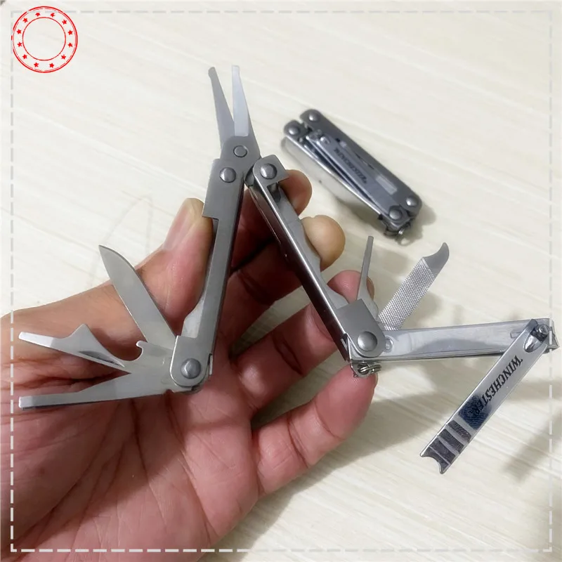 

Внешняя торговля хвост BG многофункциональные складные ножницы wimchester комбинированный инструмент кусачки для ногтей портативный нож для открывания бутылок