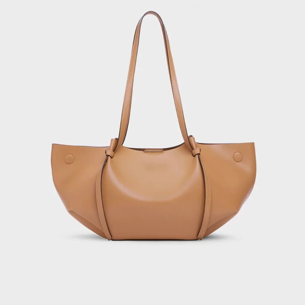 

2025 Новая сумка Wing Bag - унисекс-дизайн, большая вместительная сумка, модная и универсальная женская сумка через плечо для пригородных поездок