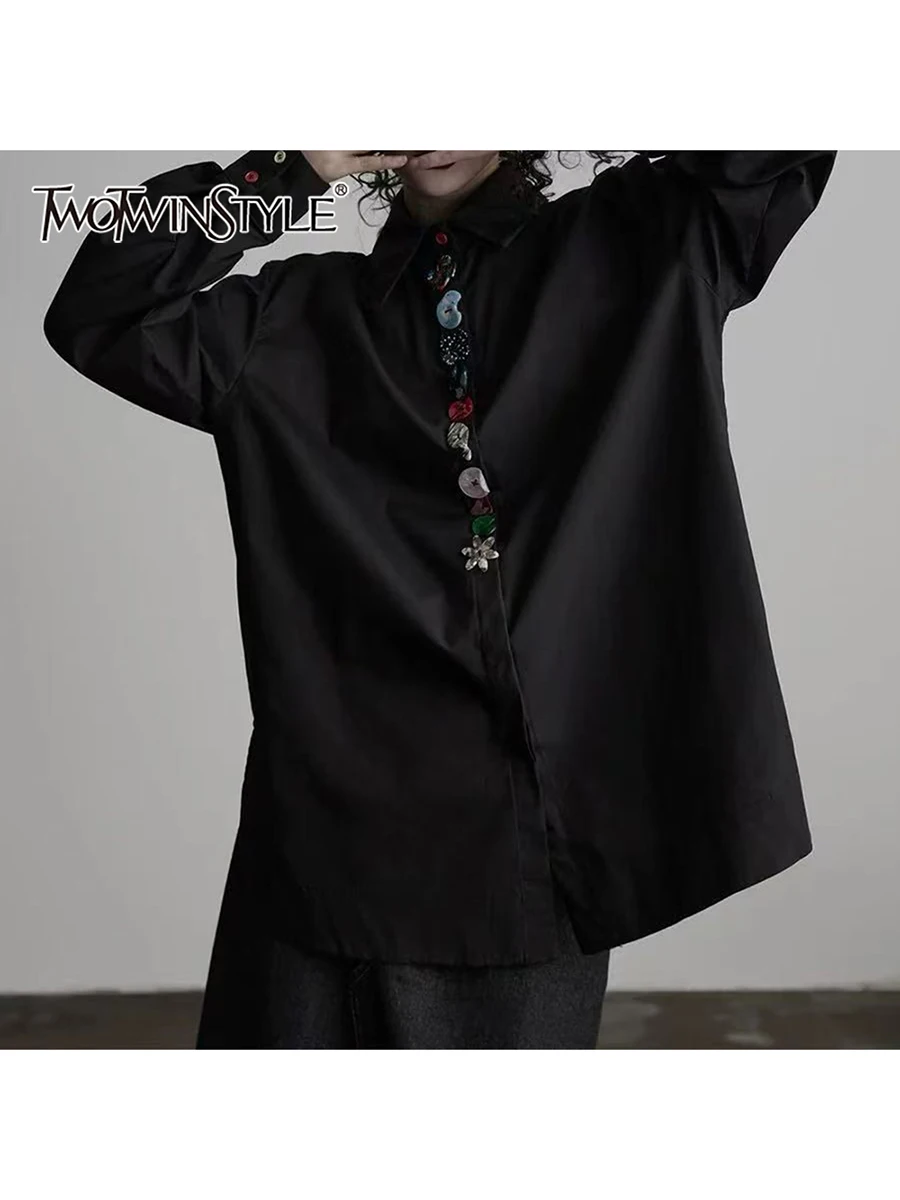 

TWOTWINSTYLE Solid Loose Spliced Irreguler Buttons Fashion Shirts for Women Lapel Long Sleeves Design Sense Shirt Female Clothes