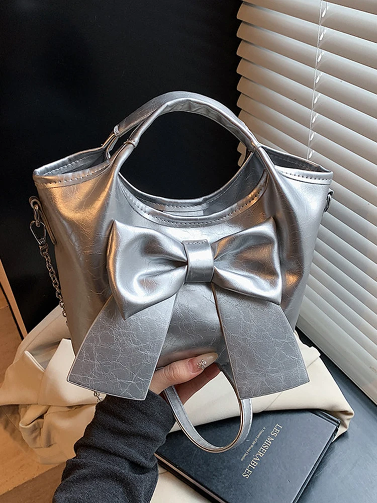 

Korean Version Bow Knot Bucket Handbags 2026 Women's New Simple Solid Color Chains Messenger Bags Cute Fashion Shoulder Bag