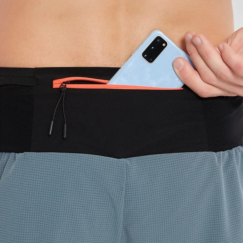 

Легкие дышащие спортивные шорты для мужчин и женщин, быстросохнущие, с карманом на молнии, для марафона и фитнес-тренировок