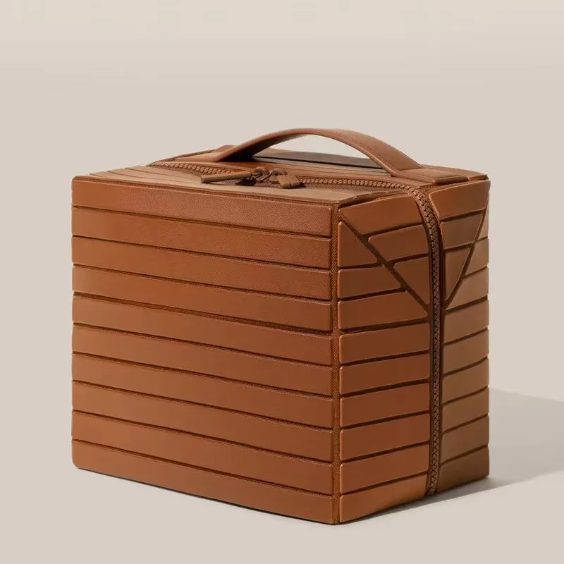 Sac de rangement Simple et pratique pour adultes, grande capacité, sac de maquillage 3D rayé pour les déplacements et les déplacements, sac à main léger et étanche en Pvc