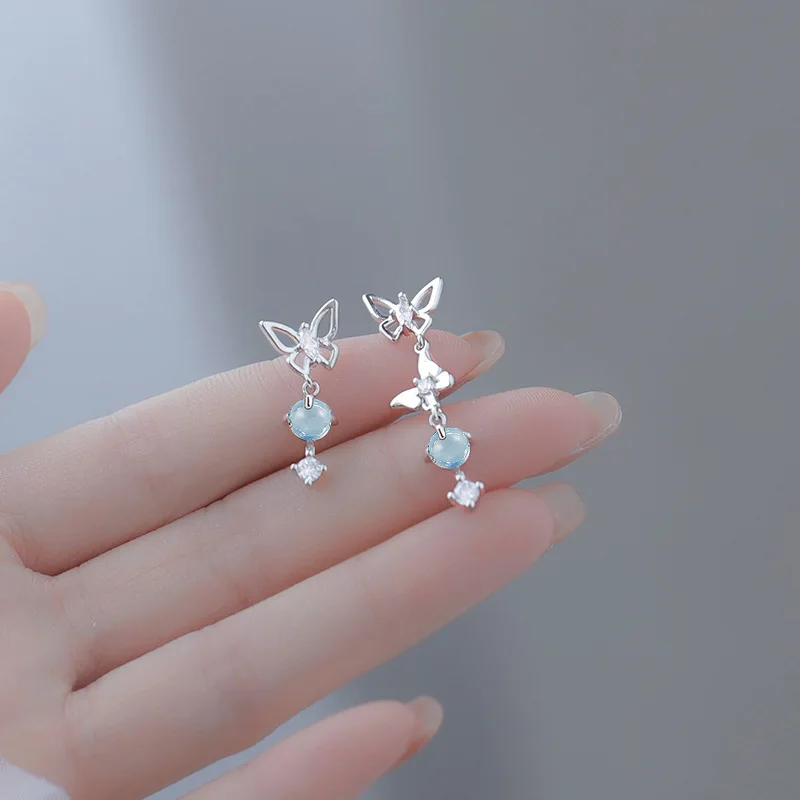 Voq-女性用バタフライイヤリング、ジルコンタッセル、ブルーモロンストーン、ライトラグジュアリー、エレガントなジュエリーギフト、韓国のファッション
