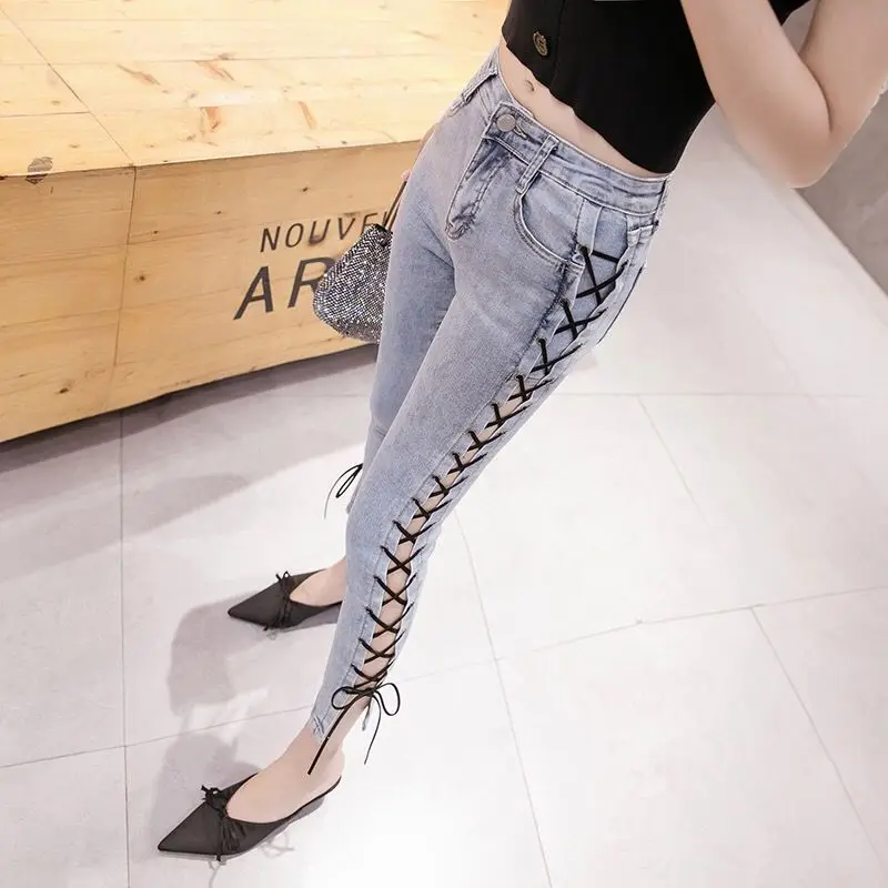 

Female Online Celebrity Strap Bandage High Waist Jeans 2023 Summer Women New Fried Street Elastic Thin Dhort Feet Pencil Pants