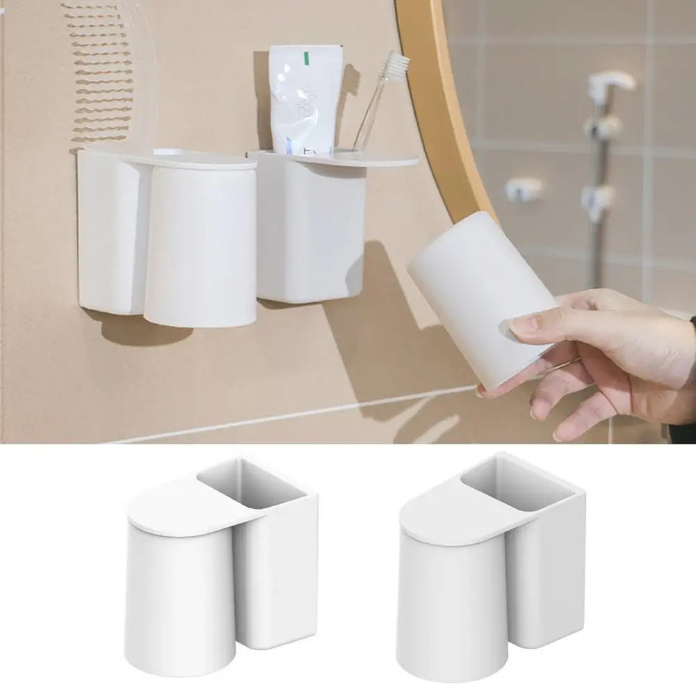 

Adhesive Toothbrush Cup Drainage Toothbrush Cup Waterproof Bathroom Storage Organizer Wall-mounted Toothbrush Cup for Home