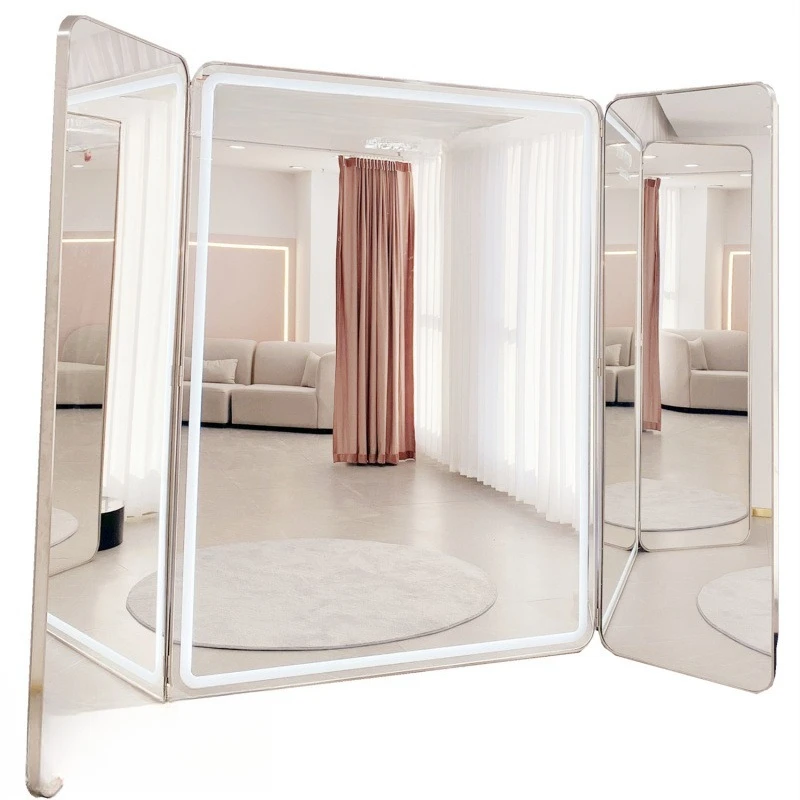 

girl fitting mirror, wedding shop tri-fold mirror, three mirrors, ultra-white to show thin body