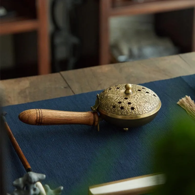 

Brass carving hollow hand-held incense burner ornament Chinese model room study tea room incense burner decoration