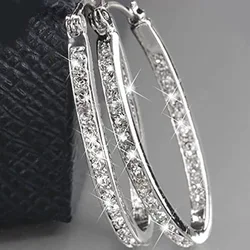 1 par de pendientes de aro grandes simples con temperamento de moda, combinación de calle con personalidad femenina, ropa de vacaciones para banquetes