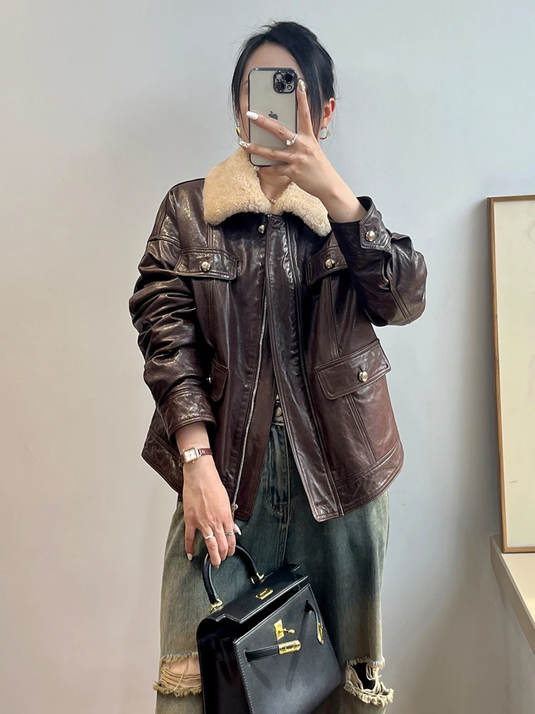 Piumino da donna caldo in piuma d'oca Giacca in vera pelle di pecora Cappotto con collo in pelliccia di pecora merino naturale Cappotti femminili di lusso