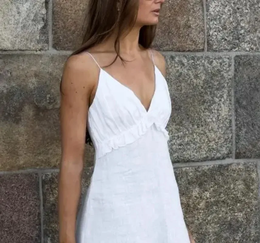 

Spring and Summer 2025 New Elegant Simple Vacation Long Dress Sexy White Cotton and Linen V-Neck Ruffled Loose Suspender Dress