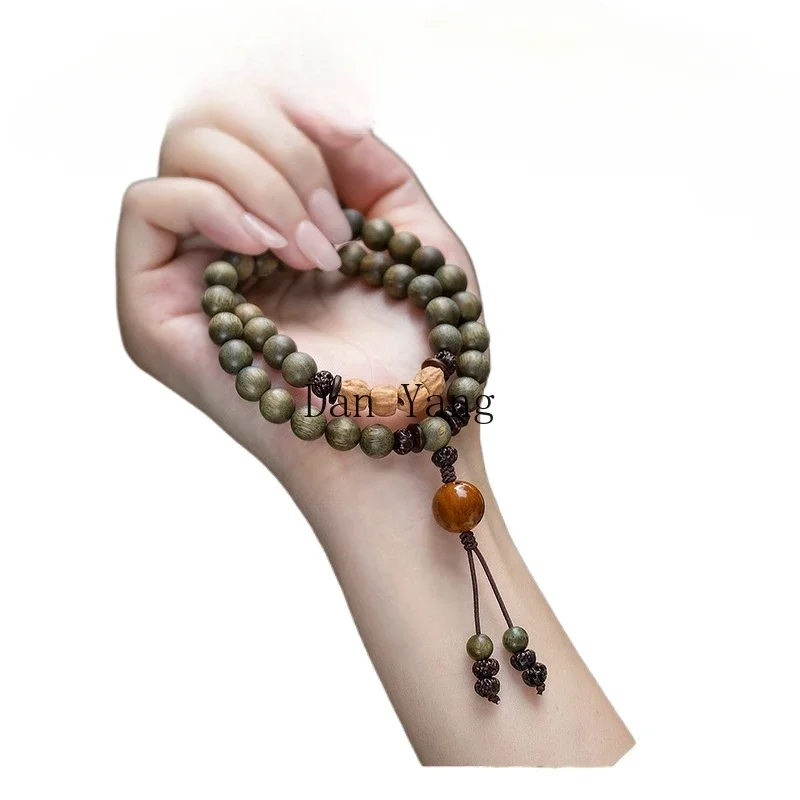 Green sandalwood Buddha bead bracelet, old sandalwood passion seeds, holding long rosary beads, male and female students playing